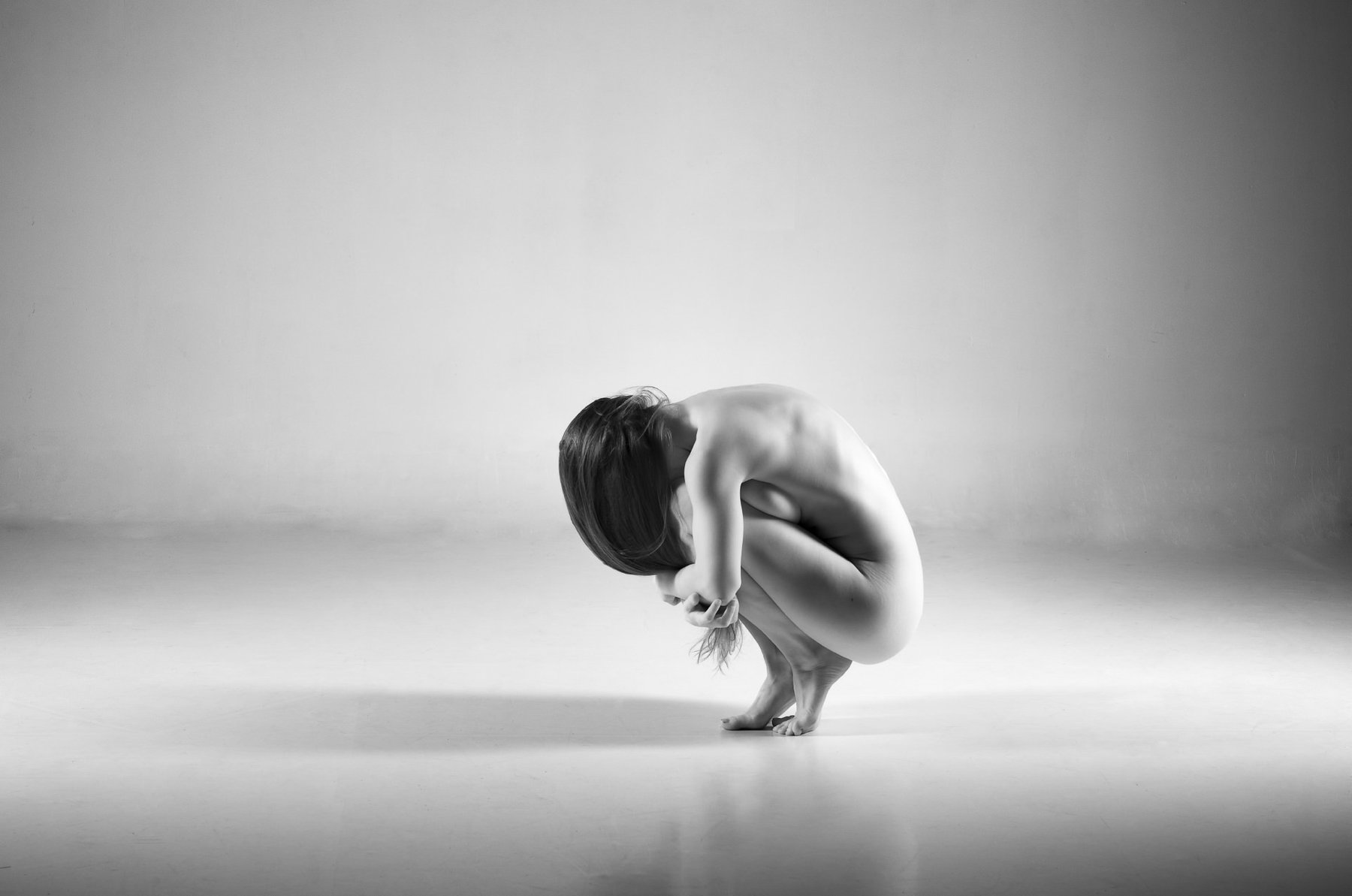 Compress — black and white figure study, Supernal series, fine art photography print by Kofi Amoa